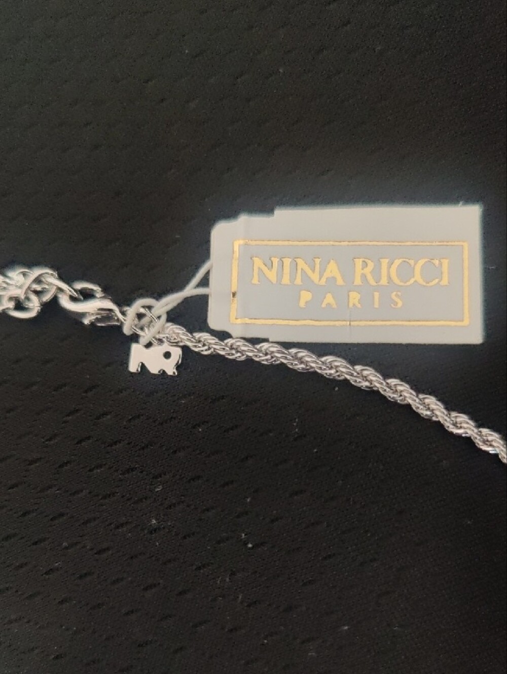 Nina Ricci Silver Heart Pendant Necklace – Sculpted Heart Design - Picture 5 of 12